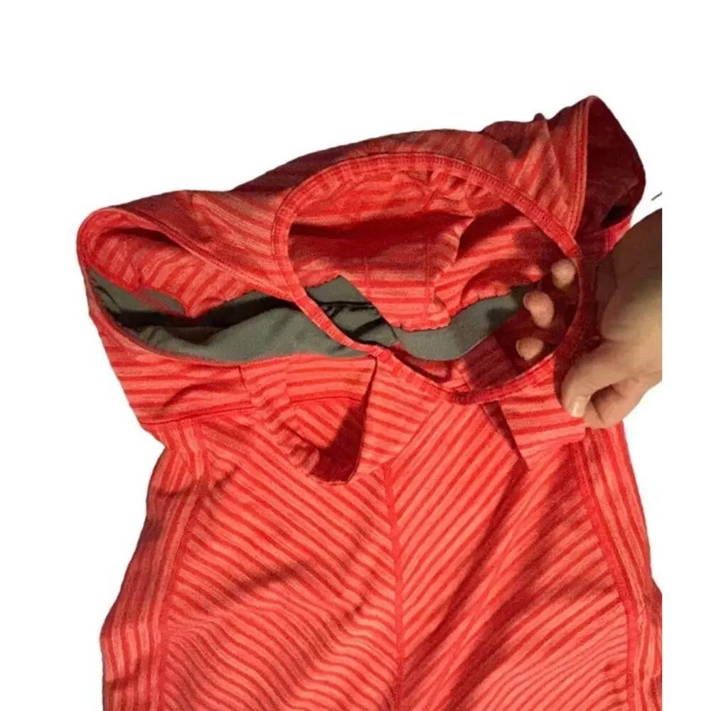Title nine vibrant coral